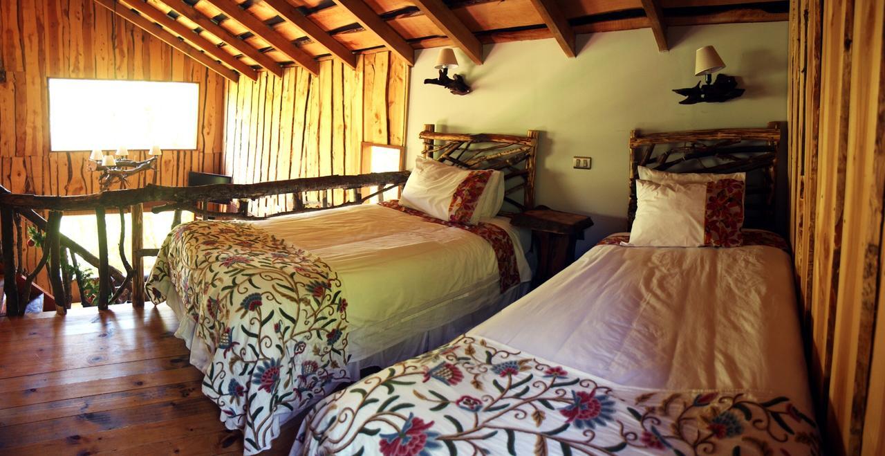 Cabanas Natural Park Lodge Пукон Экстерьер фото